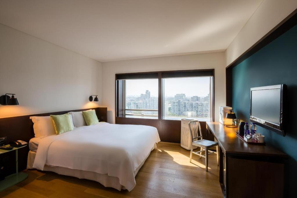Hotel New World Center Tongpai